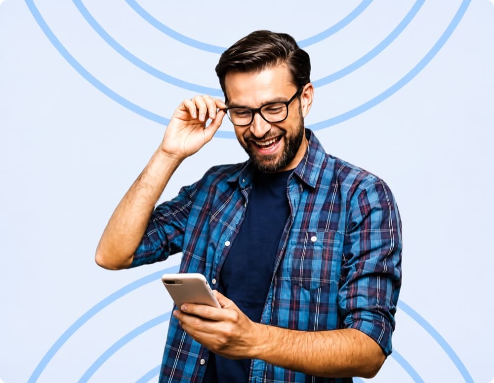A smiling customer using CSAgentIQ on his phone